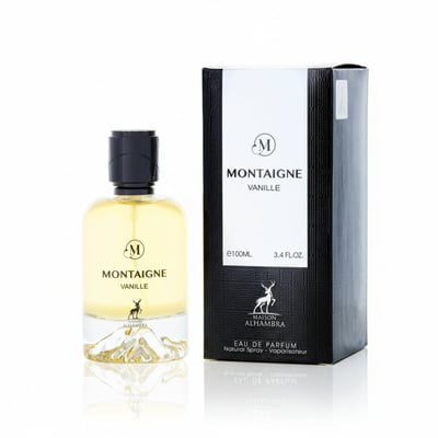 Maison Alhambra Montaigne Vanille Eau de Parfum — A clear glass perfume bottle with a black cap and yellow liquid, featuring a mountain-like design at the base, stands next to its black and white textured box with the brand logo and product details. | Maison Alhambra Montaigne Vanille Eau de Parfum — Botol kaca jernih