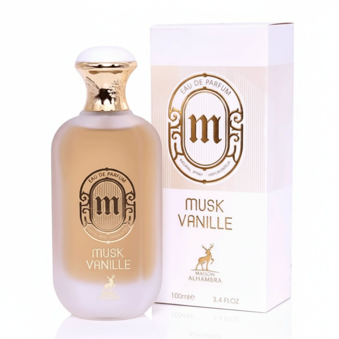 Maison Alhambra Musk Vanille by Maison Alhambra 100ml EDP — A frosted glass perfume bottle with a gold cap stands next to its white and gold box, both featuring the brand's 'm' logo. | Maison Alhambra Musk Vanille by Maison Alhambra 100ml EDP — Botol minyak wangi kaca beku dengan penutup emas berdiri di sebelah kotak