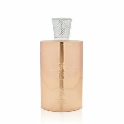 Maison Alhambra Olivia by Maison Alhambra 80ml EDP — A tall, rose gold perfume bottle with a textured white cap, featuring embossed winged and deer motifs and the brand name at the base. | Maison Alhambra Olivia by Maison Alhambra 80ml EDP — Botol minyak wangi tinggi berwarna emas ros dengan penutup putih bertekstur