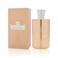 Maison Alhambra Olivia by Maison Alhambra 80ml EDP — A peach-toned perfume box stands next to a matching rose-gold perfume bottle with a silver textured cap. Both feature embossed winged deer logos and the name 'OLIVIA'. | Maison Alhambra Olivia by Maison Alhambra 80ml EDP — Kotak minyak wangi berwarna pic berdiri di
