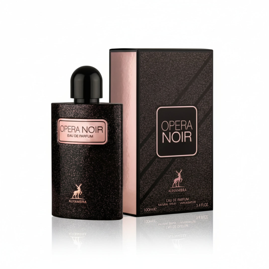 Maison Alhambra Opera Noir by Maison Alhambra 100ml EDP — Black speckled bottle with a pink label and a black cap, next to a black and pink box with a deer logo. | Maison Alhambra Opera Noir by Maison Alhambra 100ml EDP — Botol hitam berbintik dengan label merah jambu dan penutup hitam, bersebelahan dengan kotak hitam