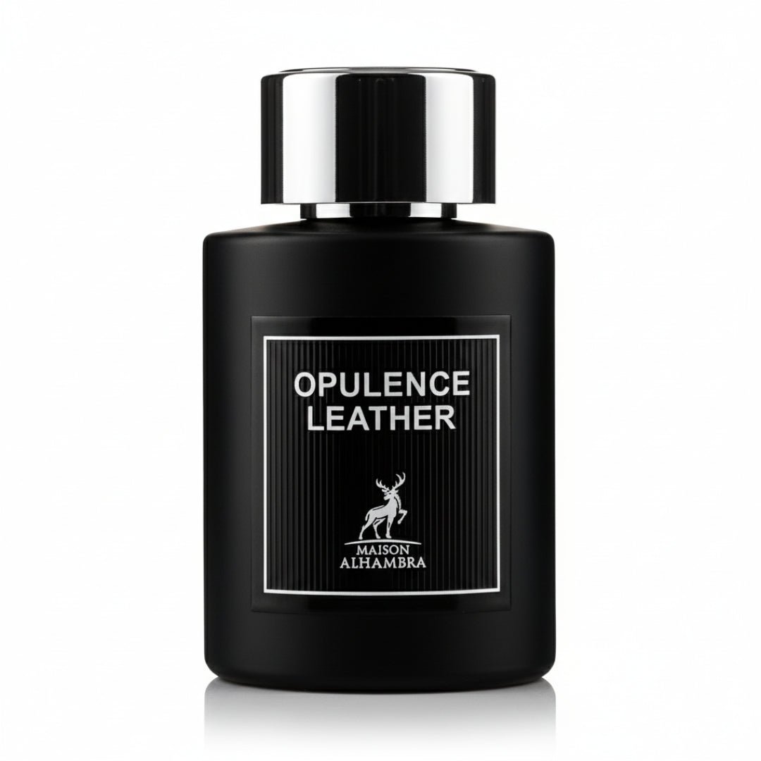 Maison Alhambra Opulence Leather — Black perfume bottle with a silver cap and a black label featuring a deer logo and the text "OPULENCE LEATHER" and "MAISON ALHAMBRA". | Botol minyak wangi hitam dengan penutup perak dan label hitam menampilkan logo rusa serta teks "OPULENCE LEATHER" dan "MAISON ALHAMBRA".