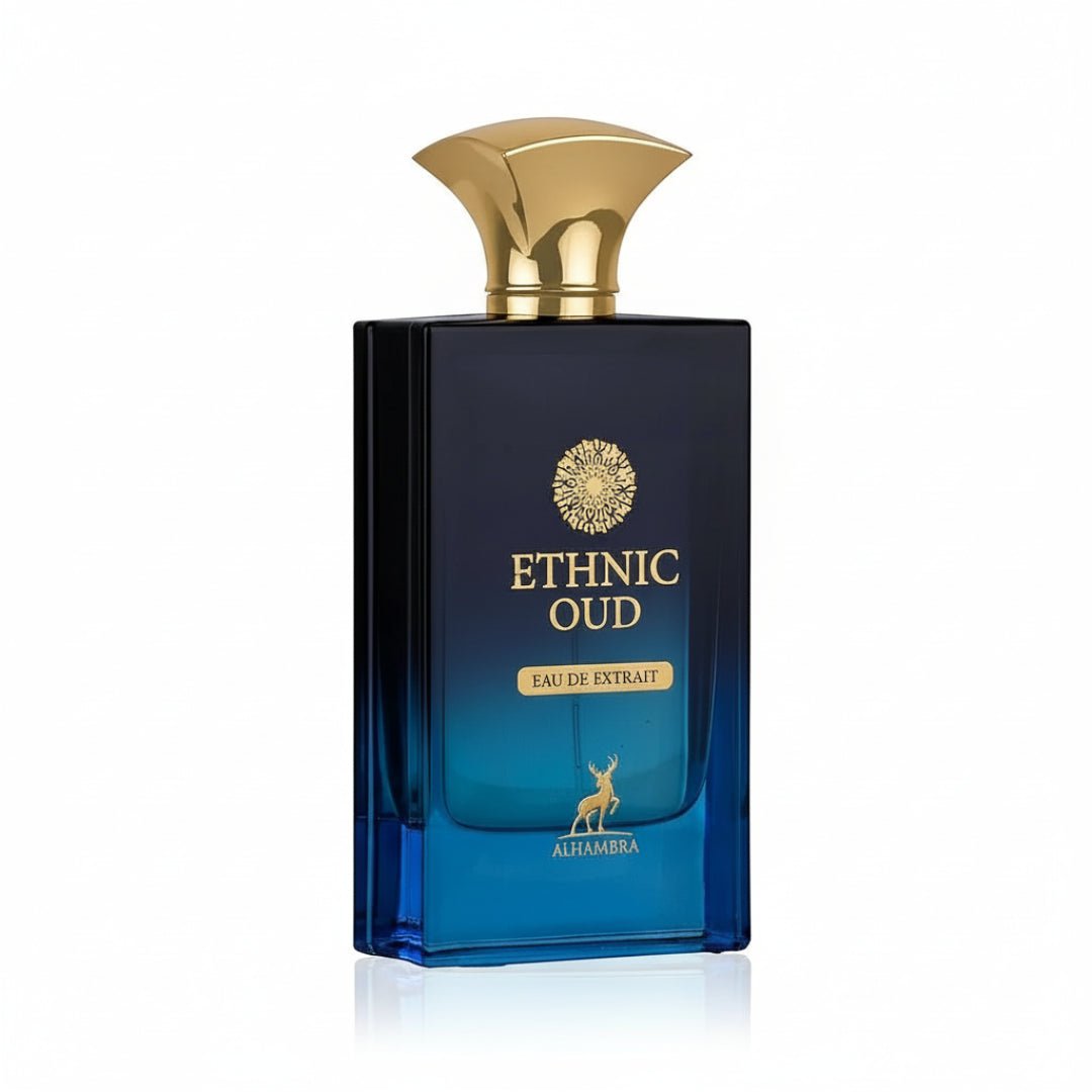 Maison Alhambra Ethnic Oud — A rectangular dark blue and gradient blue glass perfume bottle with a gold ornate cap, featuring gold text "ETHNIC OUD" and a gold deer silhouette. | Maison Alhambra Ethnic Oud — Botol kaca berwarna biru gelap dan biru gradien berbentuk segi empat dengan penutup emas berhias, menampilkan