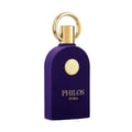 Maison Alhambra Philos Pura by Maison Alhambra 100ml EDP Man — A dark purple velvet-textured perfume bottle with a gold circular emblem and a gold ring on top, against a white background. | Maison Alhambra Philos Pura by Maison Alhambra 100ml EDP Man — Botol minyak wangi berwarna ungu gelap bertekstur baldu dengan