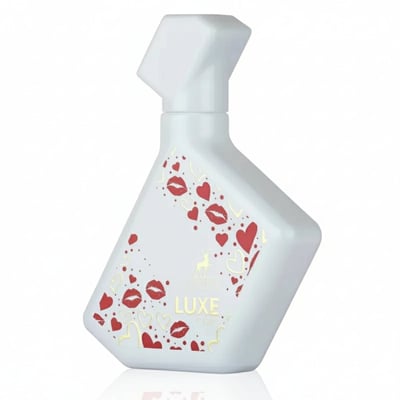 Maison Alhambra Luxe Chic by Maison Alhambra – 100 ml Women — White perfume bottle with red and gold heart and lip print accents, angled view | Maison Alhambra Luxe Chic by Maison Alhambra – 100 ml Women — Botol minyak wangi putih dengan cetakan hati dan bibir merah dan emas, pandangan bersudut