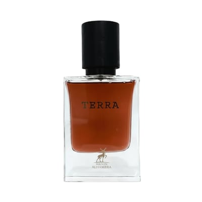 Maison Alhambra Terra – A clear glass bottle with a dark amber liquid, a black cap, and the word "TERRA" printed in black on the front. A small gold deer logo is visible at the bottom. | Maison Alhambra Terra – Botol kaca jernih dengan cecair berwarna ambar gelap, penutup hitam, dan perkataan "TERRA" dicetak hitam di