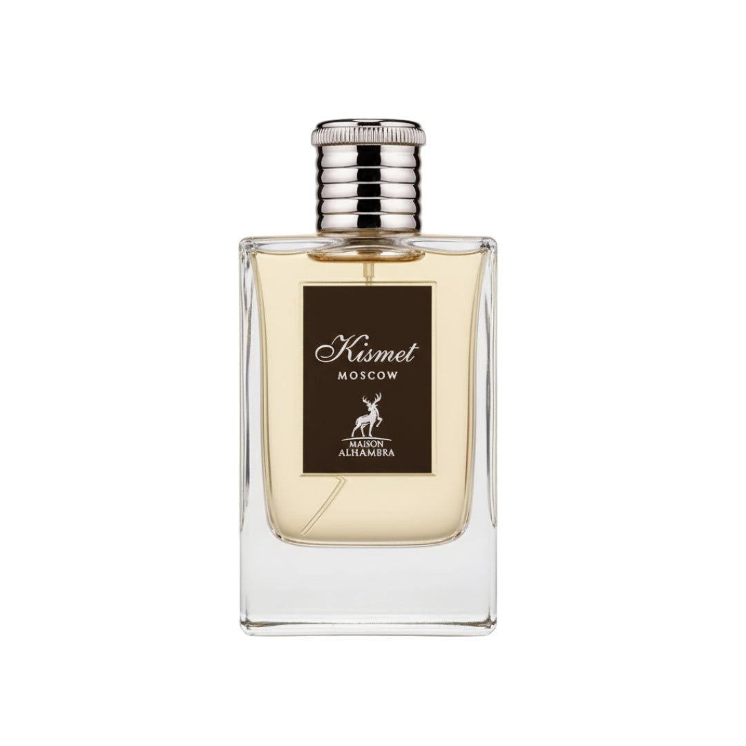 Maison Alhambra Kismet Moscow by Maison Alhambra 100ml EDP — A clear glass perfume bottle with a silver ribbed cap and a dark brown label featuring a deer silhouette and "Kismet Moscow" text. | Maison Alhambra Kismet Moscow by Maison Alhambra 100ml EDP — Botol minyak wangi kaca jernih dengan penutup berjalur perak dan