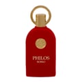 Maison Alhambra Philos Rosso Maison Alhambra 100ml EDP — A red velvet perfume bottle with a gold circular emblem and a gold ring on top, against a white background. | Maison Alhambra Philos Rosso Maison Alhambra 100ml EDP — Botol minyak wangi baldu merah dengan lambang bulat emas dan cincin emas di atas, berlatar