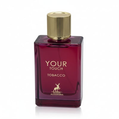 Maison Alhambra Tobacco Your Touch — A rectangular, deep red glass perfume bottle with a fluted gold cap, featuring gold text 'YOUR TOUCH TOBACCO' and a deer logo | Maison Alhambra Tobacco Your Touch — Botol kaca berwarna merah pekat berbentuk segi empat dengan penutup emas berlubang, menampilkan teks emas 'YOUR TOUCH