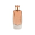 Maison Alhambra Glossy By Maison Alhambra 100ml Women EDP — A clear glass perfume bottle with a rose gold cap and a peach-colored liquid inside, featuring the word "GLOSSY" embossed vertically on the front. | Maison Alhambra Glossy By Maison Alhambra 100ml Women EDP — Botol minyak wangi kaca jernih dengan penutup emas
