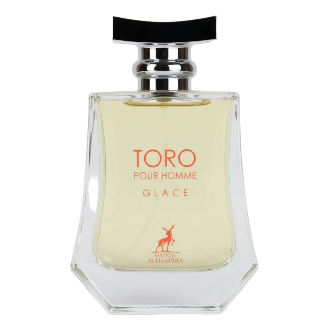 Maison Alhambra Toro Pour Homme Glace – A clear glass perfume bottle with a light yellow liquid, featuring orange text and a deer logo. | Maison Alhambra Toro Pour Homme Glace – Botol minyak wangi kaca jernih dengan cecair kuning muda, menampilkan teks oren dan logo rusa.