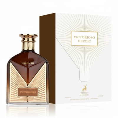 Maison Alhambra Victorioso Heroic — A brown glass perfume bottle with gold accents and a gold label reading 'VICTORIOSO' sits next to its white and gold patterned box. | Maison Alhambra Victorioso Heroic — Botol kaca perang dengan aksen emas dan label emas bertulis 'VICTORIOSO' terletak di sebelah kotak corak putih
