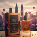 Maison Alhambra Your Touch Intense by Maison Alhambra 100ml — A perfume bottle and its box are displayed with petals and confetti against a city skyline at sunset. | Botol minyak wangi dan kotaknya dipamerkan dengan kelopak dan confetti berlatarkan langit bandar ketika matahari terbenam.